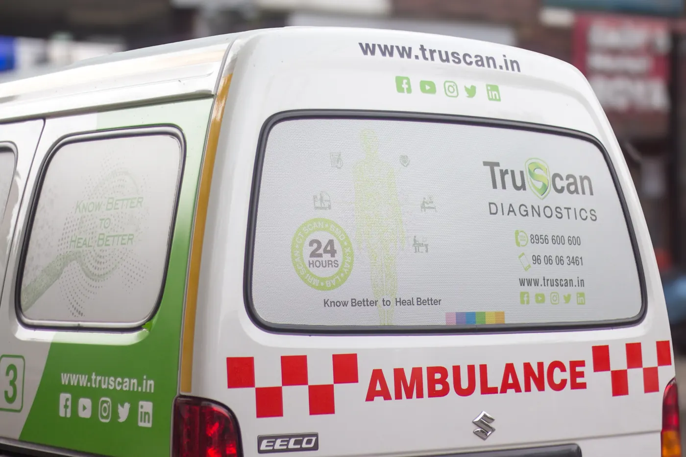TruScan Diagnostics ambulance rear view with contact details