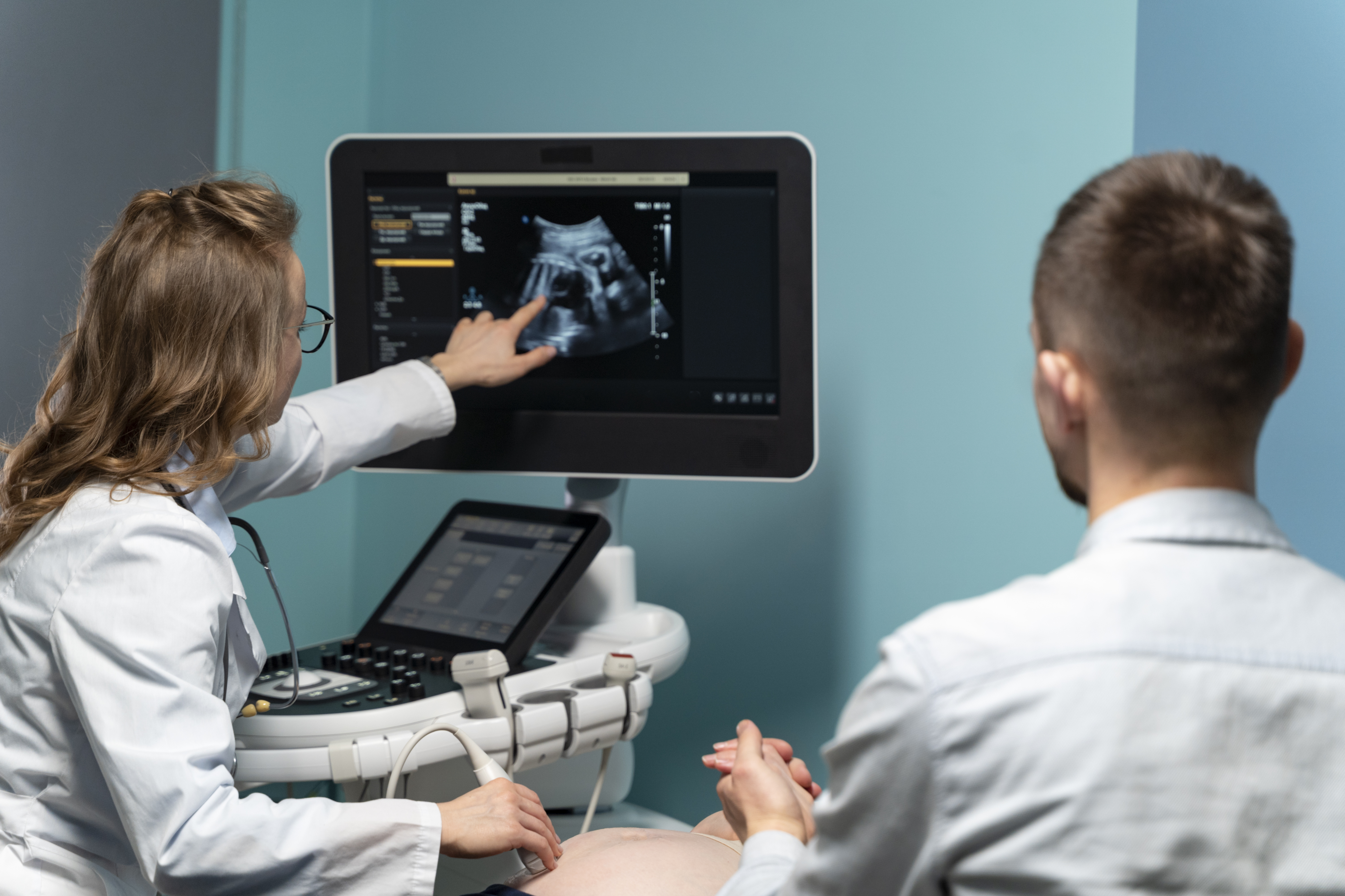 Specialist explaining a diagnostic scan to a patient