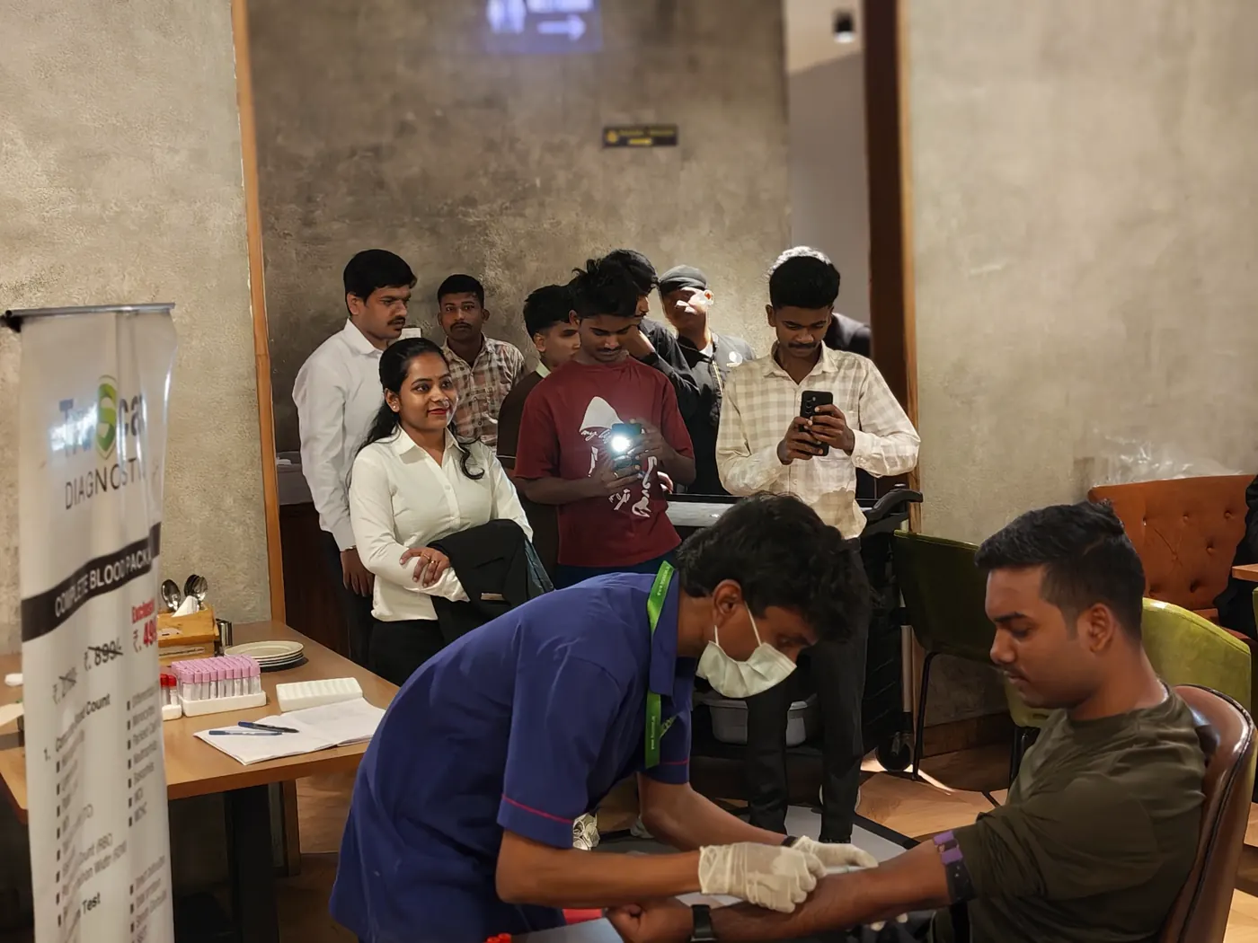 TruScan phlebotomist collecting a blood sample from a patient